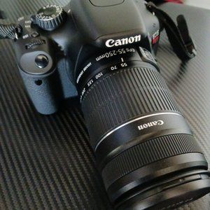 Canon EOS Rebel T2i SLR digital camera with 2 lenses plus